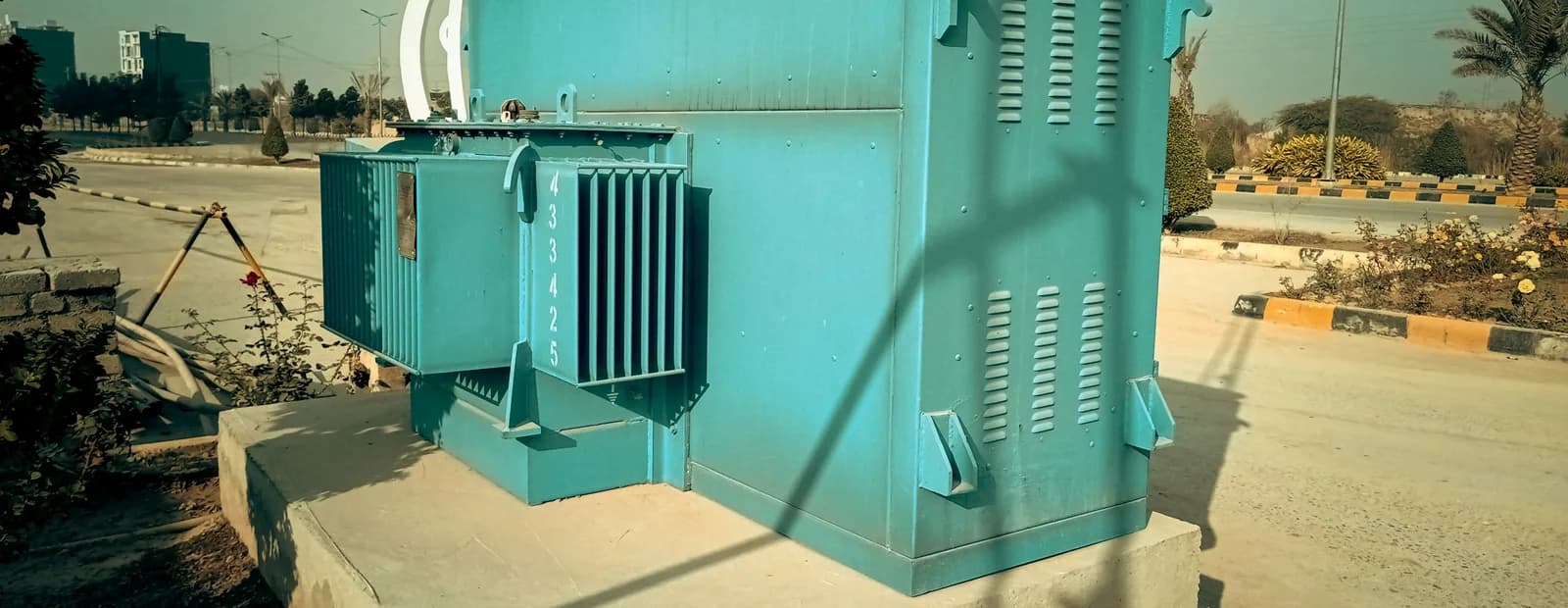 An electrical power generator unit installed at the roadside