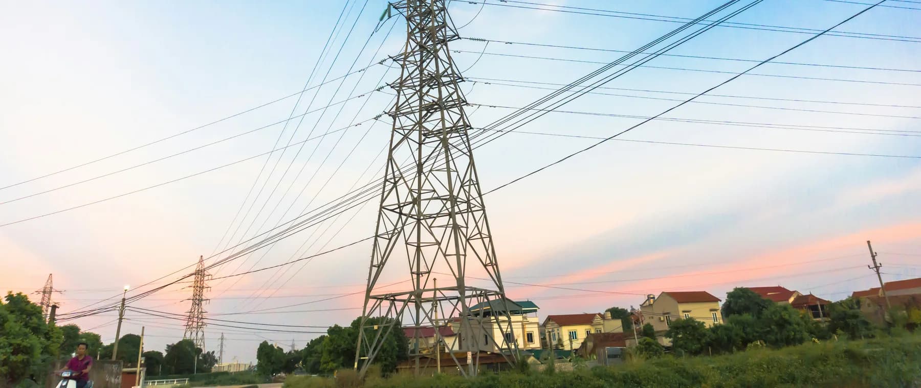 A high-voltage transmission tower carrying distribution lines